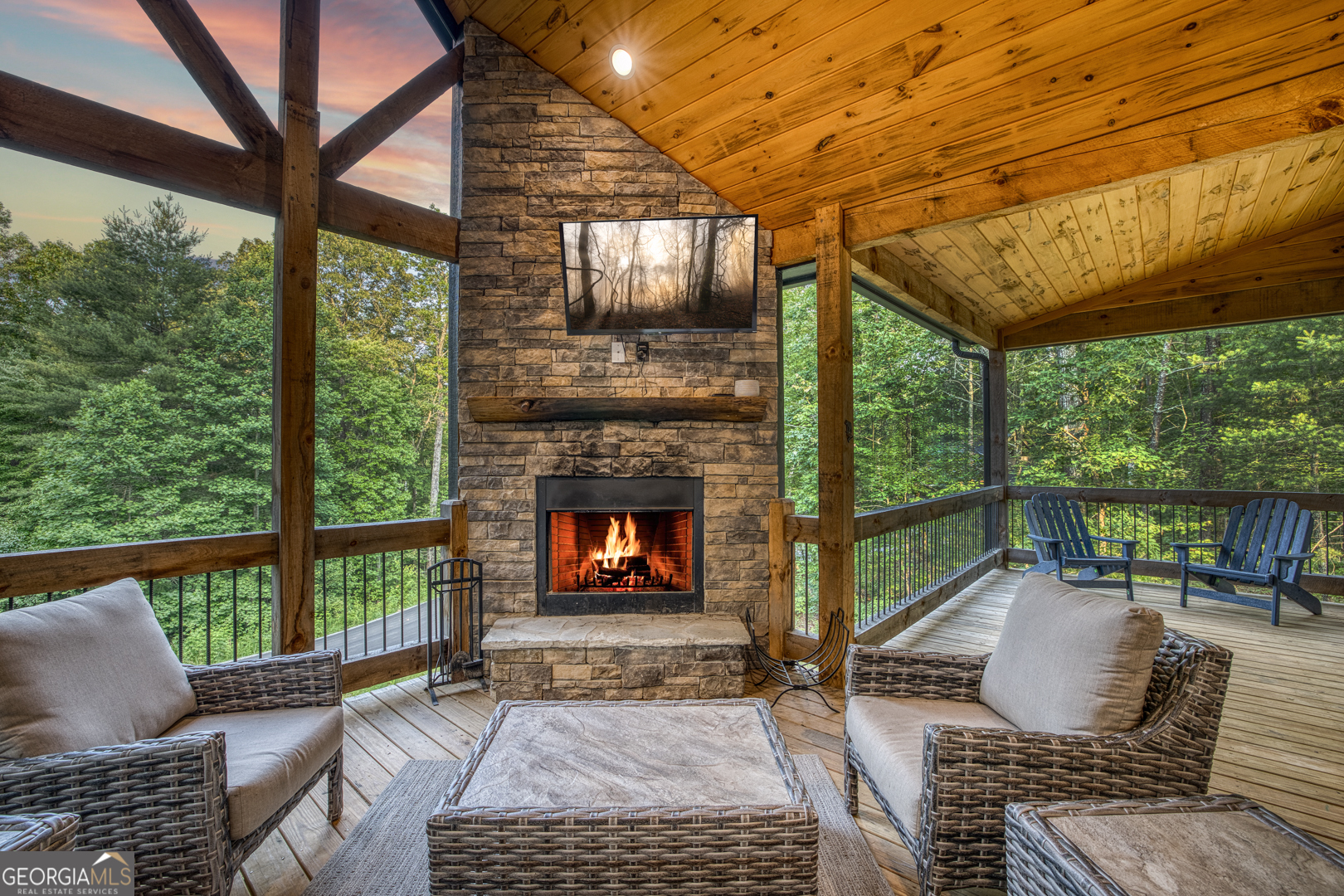 284 Lees Ride McCaysville, GA 30555 - Photo 72 of 104 a outdoor living space with patio furniture and a fireplace