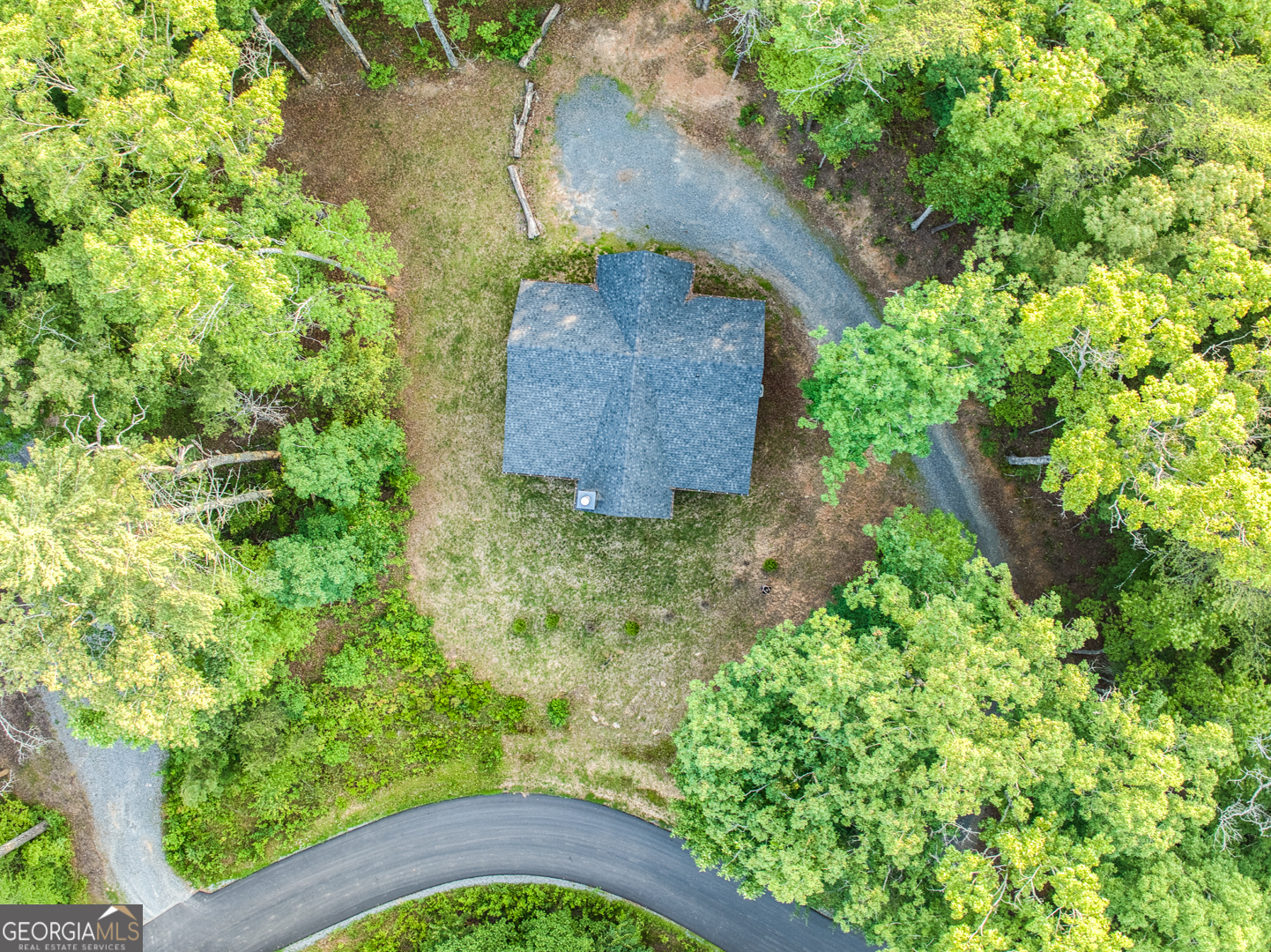 284 Lees Ride McCaysville, GA 30555 - Photo 90 of 104 an aerial view of a house with a yard