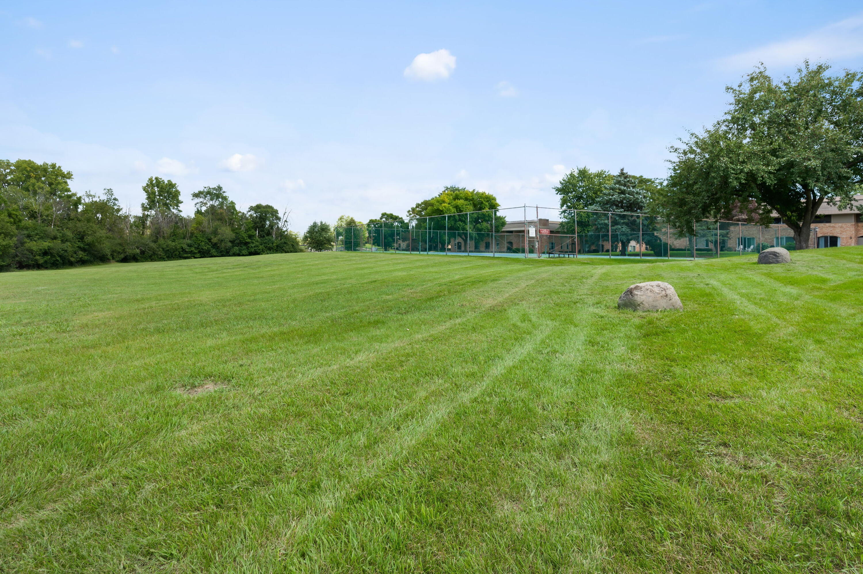 11958 West Mill Road, Unit 19 Milwaukee, WI 53225 - Photo 29 of 30 20 acres of green space offers: 2 pools, picnic areas, nature trail, clubhouse, dog runs and more!