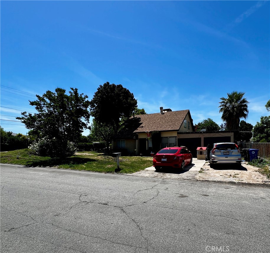 a view of a car parked in front of a house