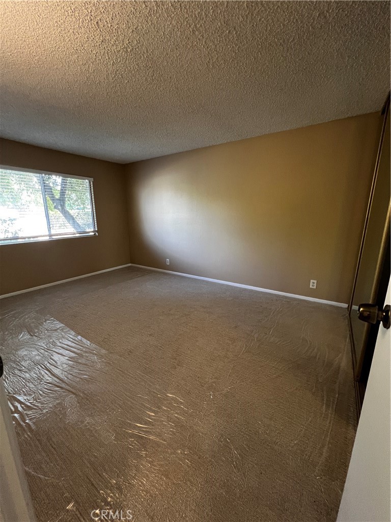 1744 Capri Avenue Mentone, CA 92359 - Photo 10 of 24 a view of room and window