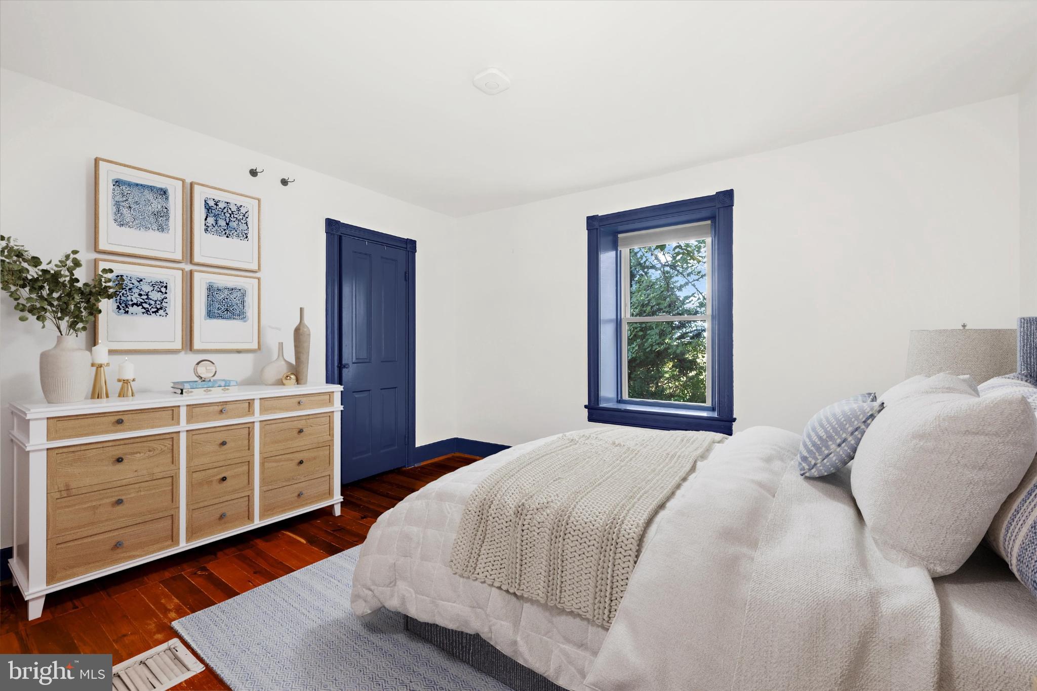 252 Granny Branch Road Church Hill, MD 21623 - Photo 34 of 75 Serene bedroom with charming blue accents.
