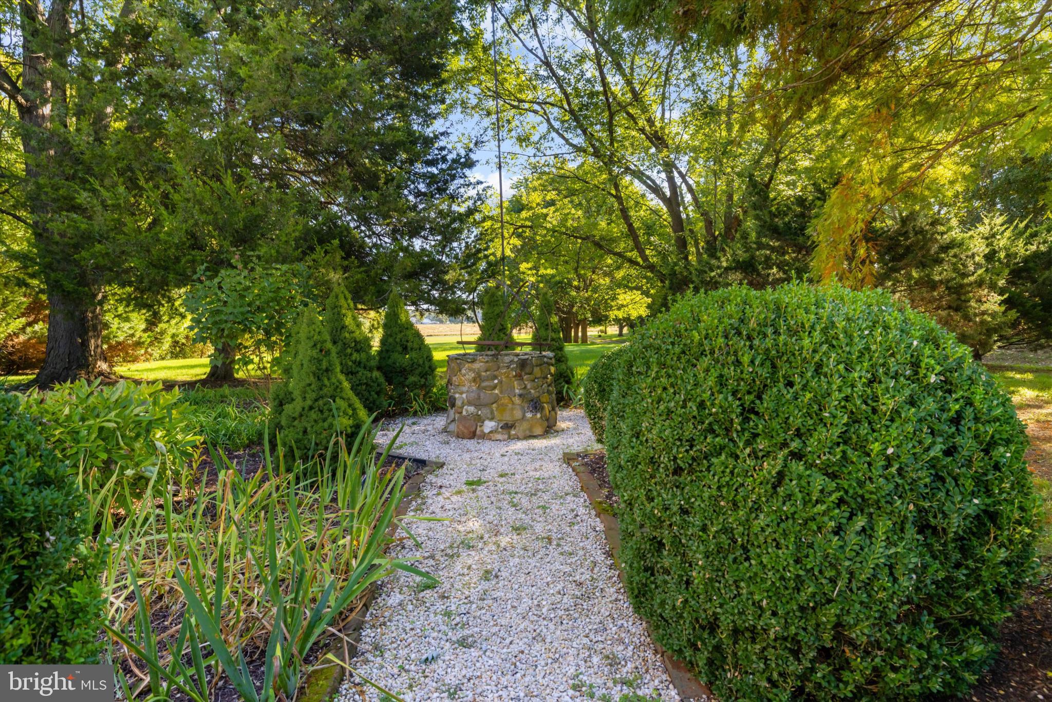 252 Granny Branch Road Church Hill, MD 21623 - Photo 56 of 75 Tranquil garden path with a charming well.