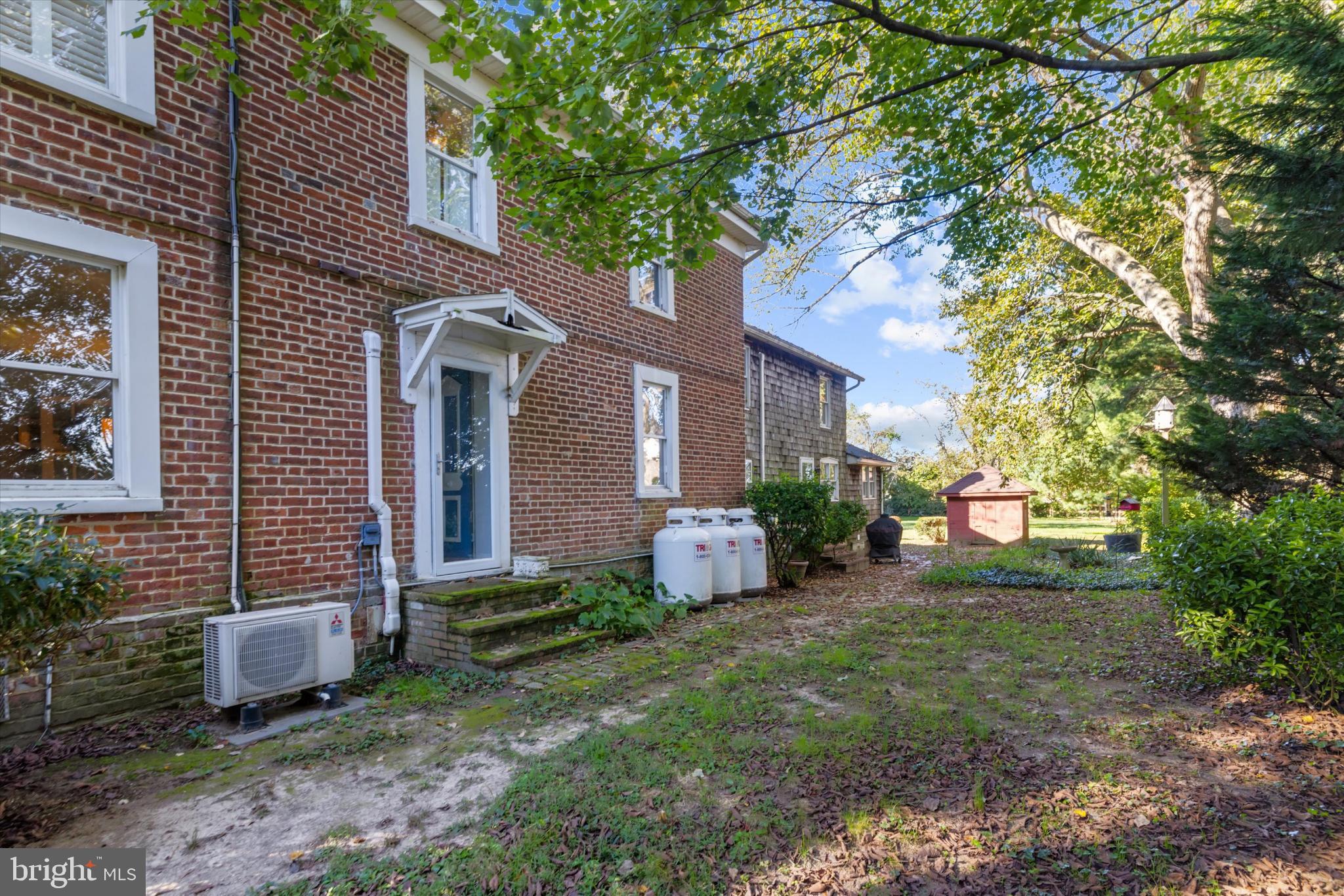 252 Granny Branch Road Church Hill, MD 21623 - Photo 66 of 75 Charming brick home with lush greenery.