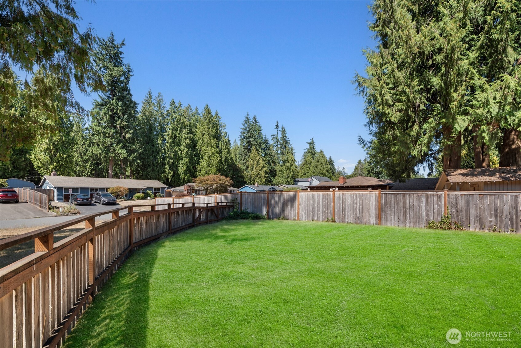 19229 3rd Drive Southeast Bothell, WA 98012 - Photo 20 of 22 a view of a yard with wooden fence