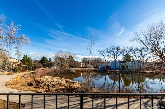 a view of a lake from a balcony