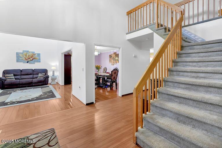 389 Aldrich Road Howell, NJ 07731 - Photo 5 of 55 a view of entryway and hall with wooden floor