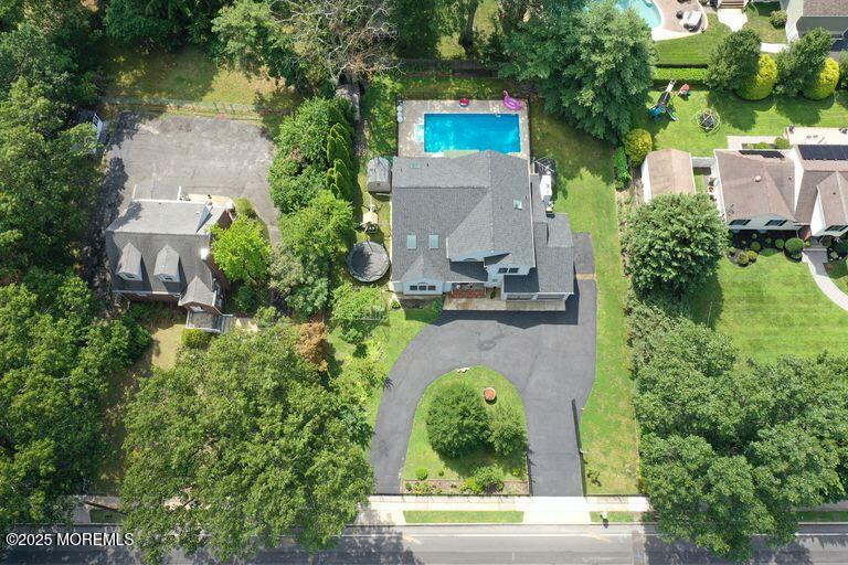 389 Aldrich Road Howell, NJ 07731 - Photo 54 of 55 an aerial view of residential house with outdoor space and trees all around