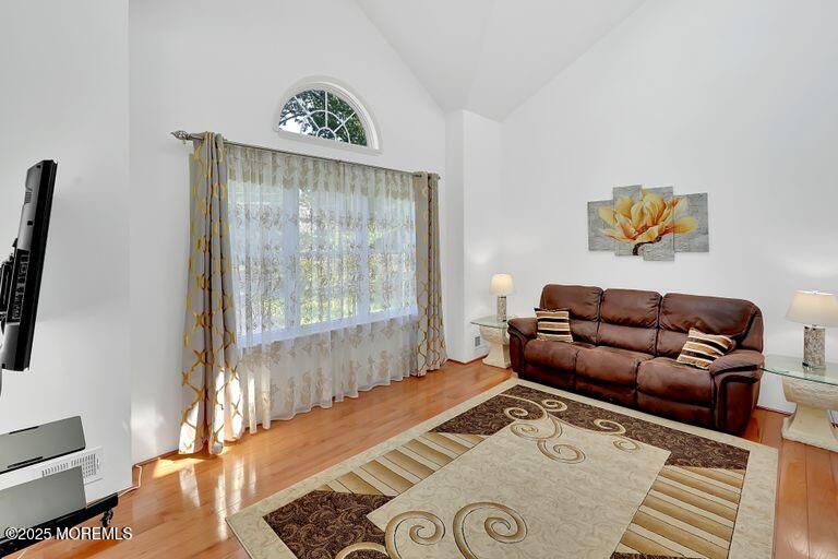 389 Aldrich Road Howell, NJ 07731 - Photo 6 of 55 a living room with furniture and a window