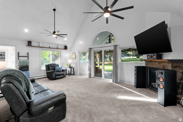 10686 South Covered Brg Cyn Road, Unit 14 Spanish Fork, UT 84660 - Photo 31 of 44 Living room featuring vaulted ceilings, recessed lighting, and a prominent fireplace with a wood mantel
