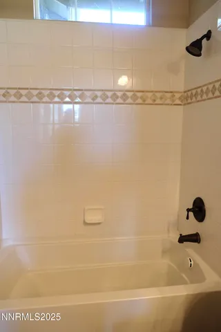 a bathroom with a bathtub