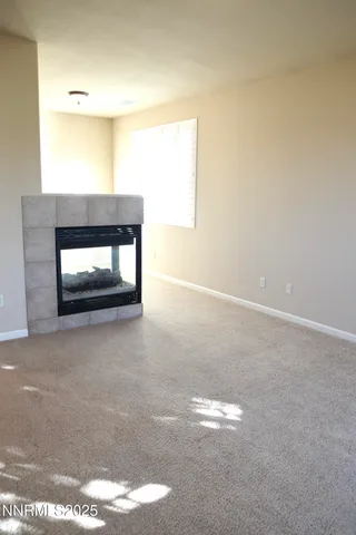a view of room with a fireplace