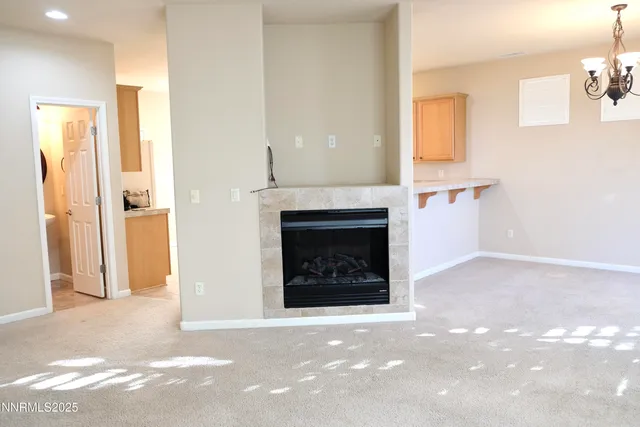 a view of a livingroom with a fireplace