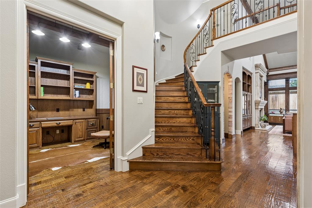 1608 Tuscan Ridge Circle Southlake, TX 76092 - Photo 4 of 36 a view of a livingroom with furniture and stairs