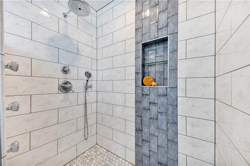 232 South Mathilda Street Friendship Park, PA 15224 - Photo 20 of 25 DELTA fixtures everywhere! Check out the 3 body sprayers..