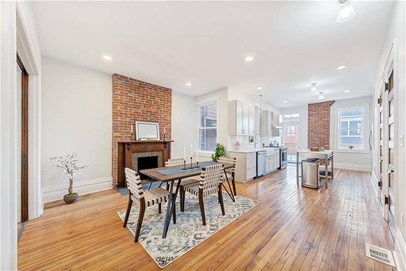 232 South Mathilda Street Friendship Park, PA 15224 - Photo 5 of 25 OPEN CONCEPT - dining area & kitchen. Exposed brick & original hardwood floors offer all the charm!