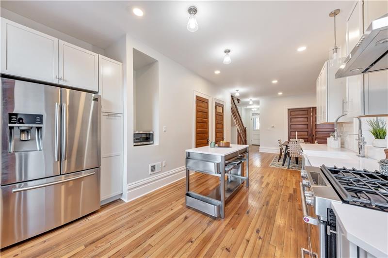 232 South Mathilda Street Friendship Park, PA 15224 - Photo 10 of 25 (The door to the deck is behind you). Another angle showing off the open concept and all the newness!