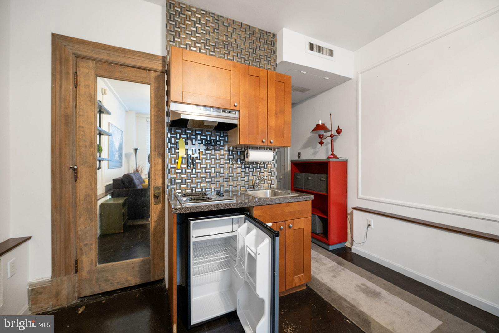 1324 Locust Street, Unit 309 Philadelphia, PA 19107 - Photo 11 of 38 Kitchenette w/ 2-top burners & mini-fridge