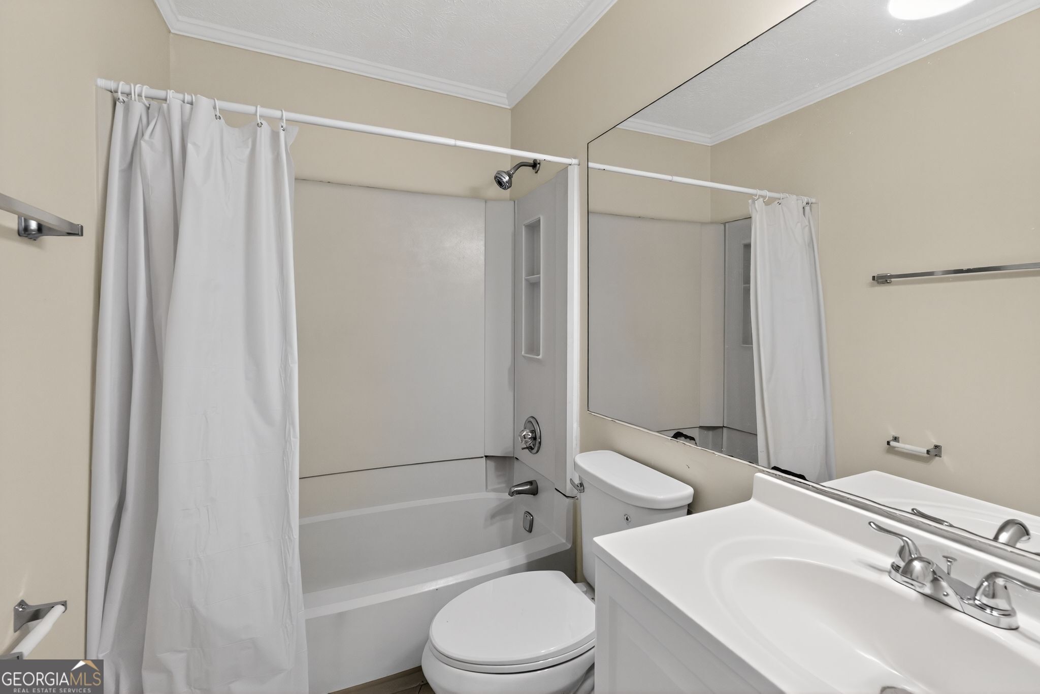 898 Chippendale Lane Norcross, GA 30093 - Photo 13 of 18 a bathroom with a sink toilet and shower