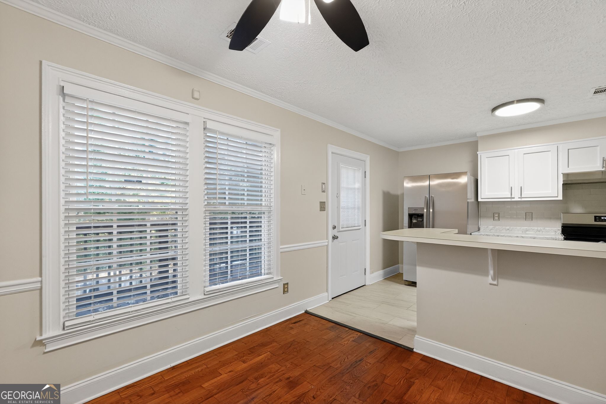 898 Chippendale Lane Norcross, GA 30093 - Photo 7 of 18 a view of kitchen with furniture wooden floor and window