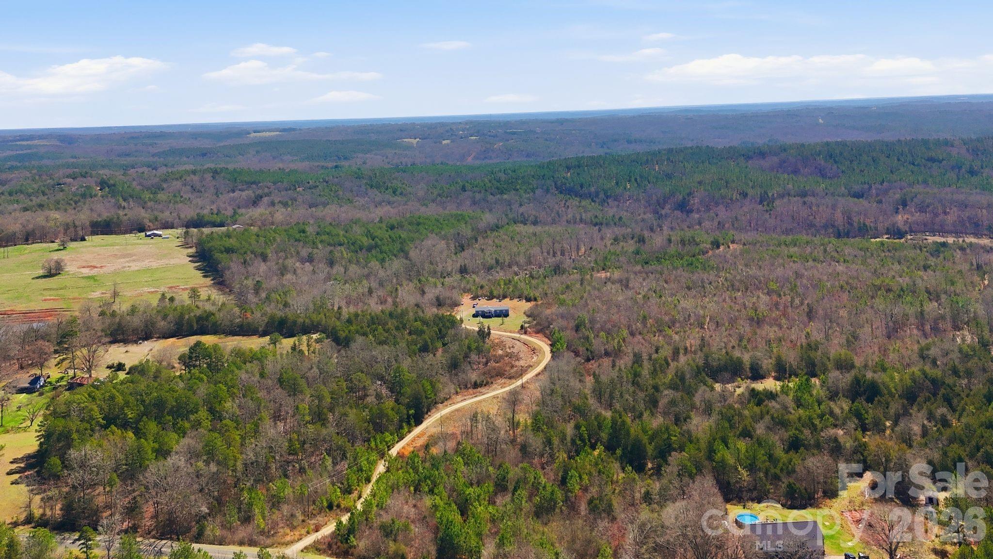 13562 Smithford Road Hickory Grove, SC 29717 - Photo 2 of 3 a view of a yard with an outdoor seating
