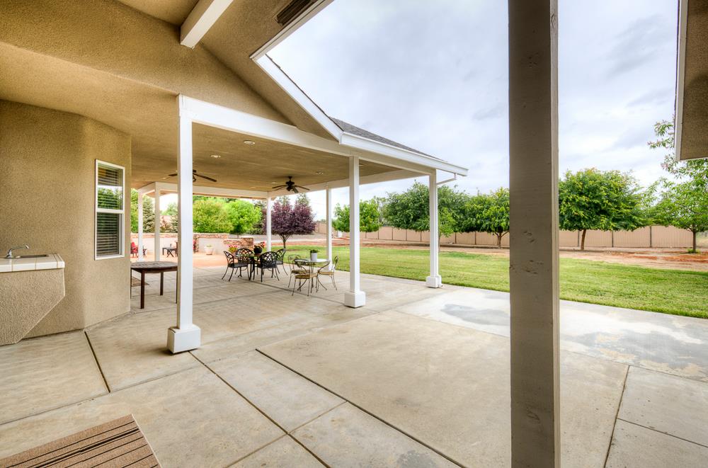 17465 Monreal Road Madera, CA 93636 - Photo 15 of 59 a view of a room with porch and patio