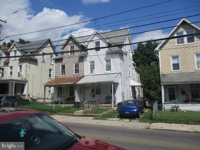 957 Springfield Road Darby, PA 19023 - Photo 11 of 42 a street view along with residential houses