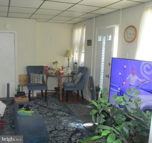 957 Springfield Road Darby, PA 19023 - Photo 18 of 42 a dining room with furniture and a potted plant