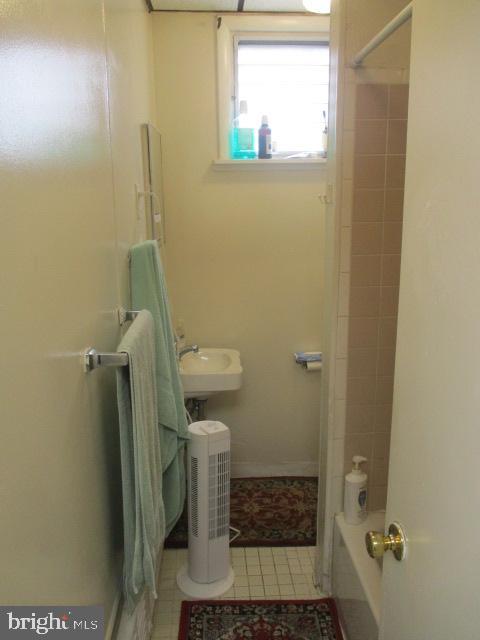 957 Springfield Road Darby, PA 19023 - Photo 21 of 42 a bathroom with a sink and toilet
