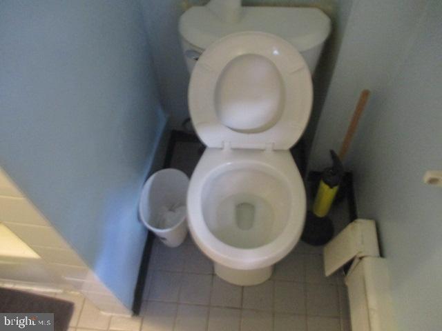 957 Springfield Road Darby, PA 19023 - Photo 25 of 42 a close view of a toilet in a bathroom