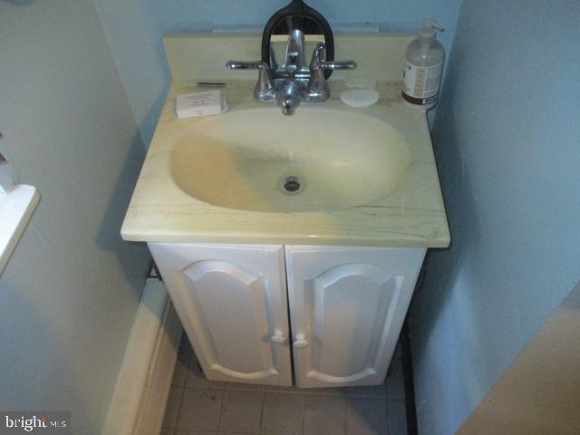 957 Springfield Road Darby, PA 19023 - Photo 26 of 42 a bathroom with a sink