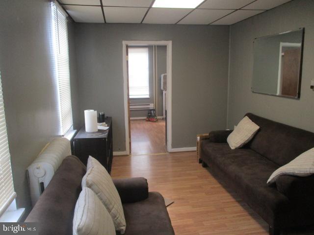 957 Springfield Road Darby, PA 19023 - Photo 27 of 42 a living room with furniture and a window