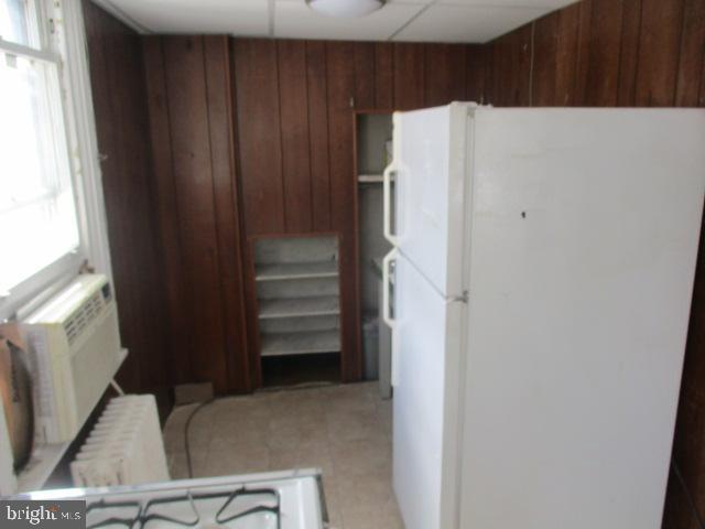 957 Springfield Road Darby, PA 19023 - Photo 40 of 42 a view of storage and utility room with refrigerator