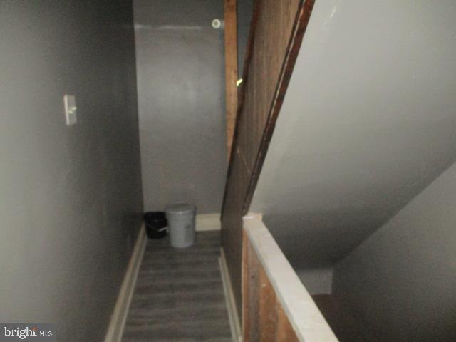 957 Springfield Road Darby, PA 19023 - Photo 10 of 42 a view of a hallway with a wooden floor