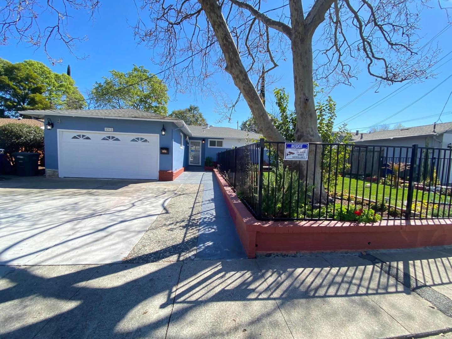 1312 Carleton Drive Concord, CA 94518 - Photo 1 of 16 a view of a bench in a back yard of the house