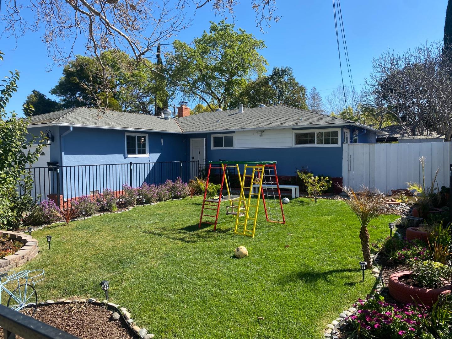 1312 Carleton Drive Concord, CA 94518 - Photo 16 of 16 a view of a backyard with table and chairs potted plants and large tree