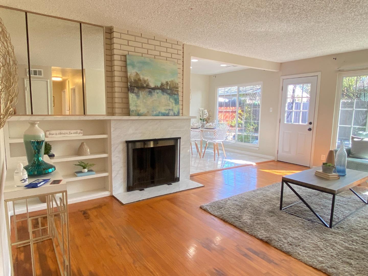 1312 Carleton Drive Concord, CA 94518 - Photo 4 of 16 a living room with furniture and a fireplace