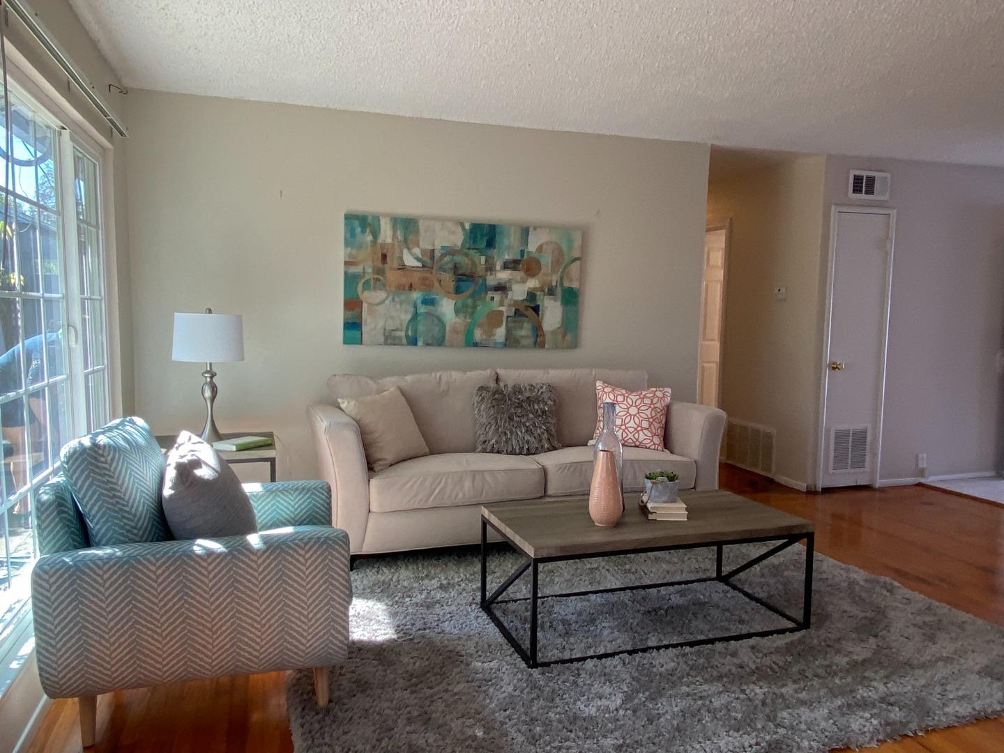 1312 Carleton Drive Concord, CA 94518 - Photo 5 of 16 a living room with furniture and a potted plant
