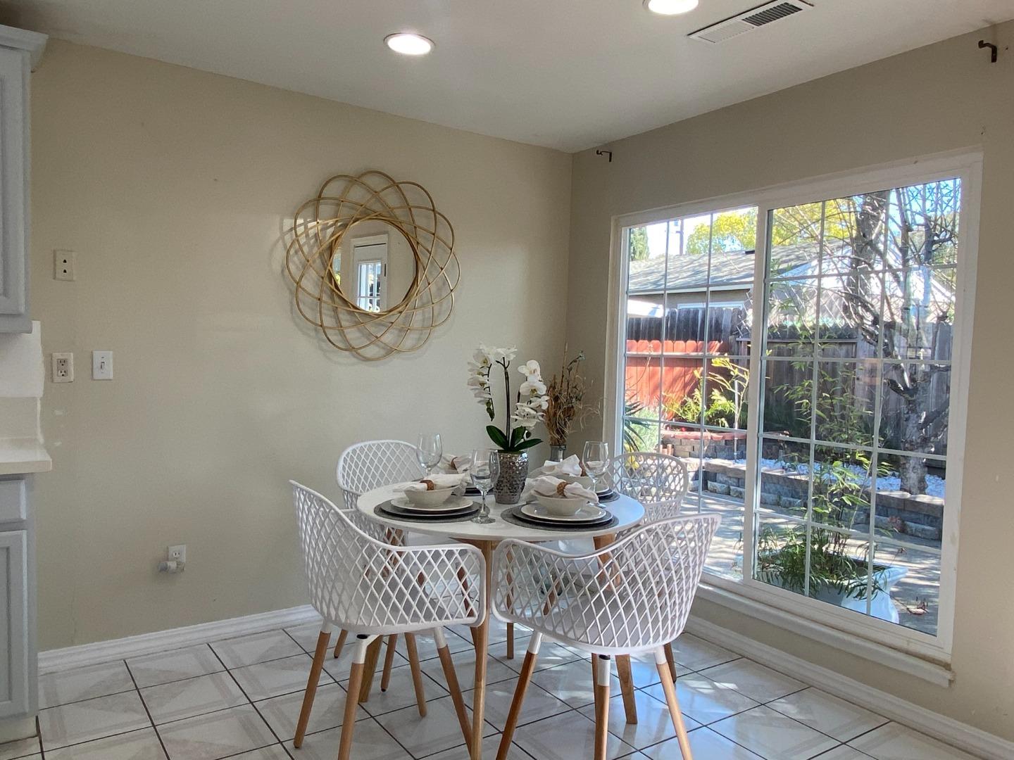 1312 Carleton Drive Concord, CA 94518 - Photo 8 of 16 a dining room with furniture and window