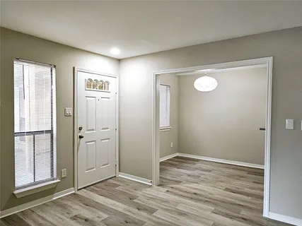 wooden floor and windows in a room