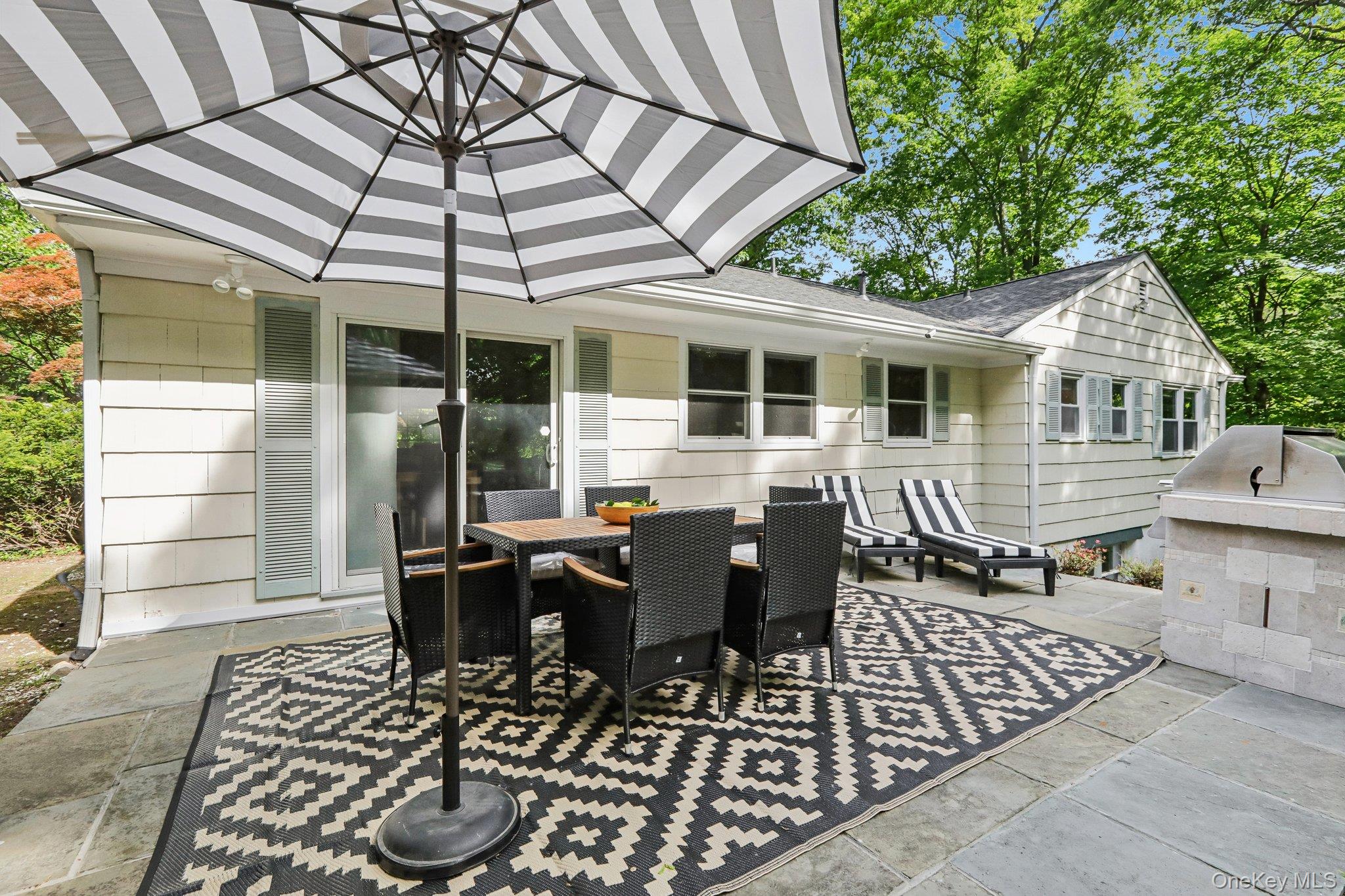 62 Mohegan Road Larchmont, NY 10538 - Photo 5 of 46 a view of a house with patio