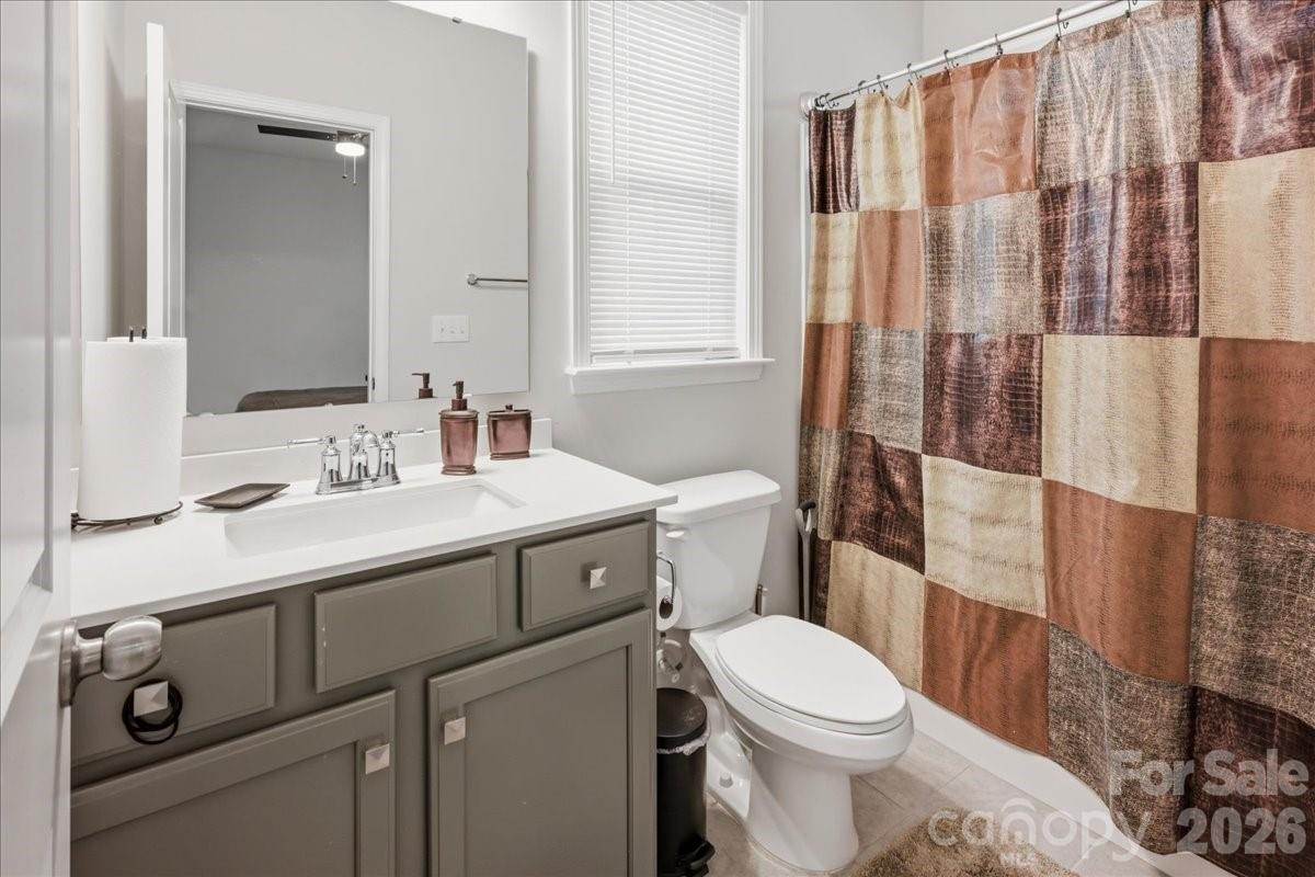 3001 Sterling Drive Waxhaw, NC 28173 - Photo 15 of 38 a bathroom with a sink toilet and shower