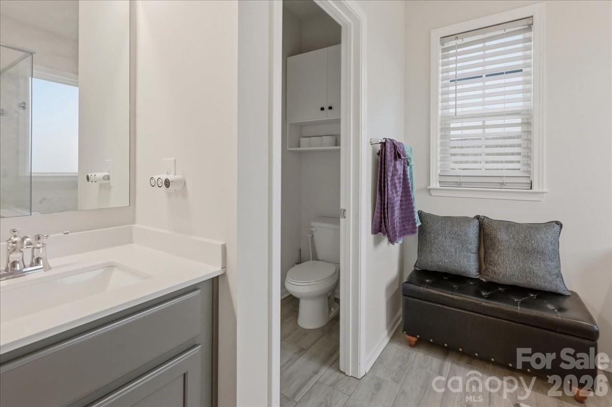 3001 Sterling Drive Waxhaw, NC 28173 - Photo 28 of 39 a living room with a couch and a window