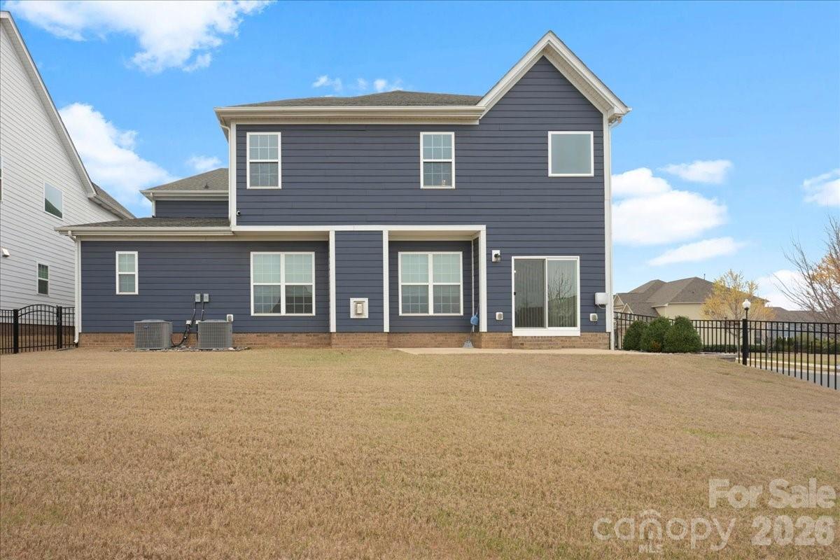 3001 Sterling Drive Waxhaw, NC 28173 - Photo 38 of 39 a front view of a house with a yard and garage