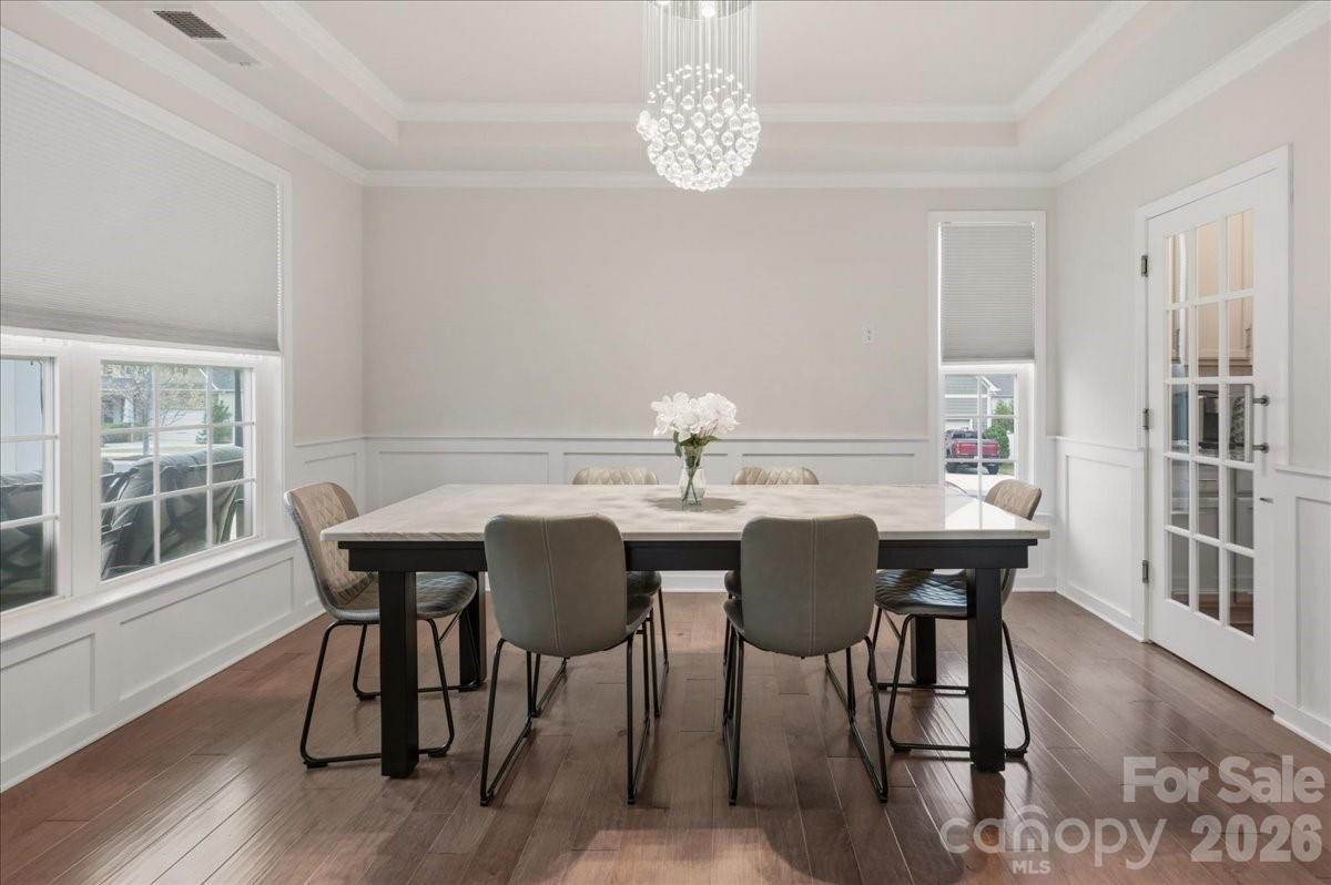 3001 Sterling Drive Waxhaw, NC 28173 - Photo 8 of 39 a view of a dining room with furniture window and wooden floor