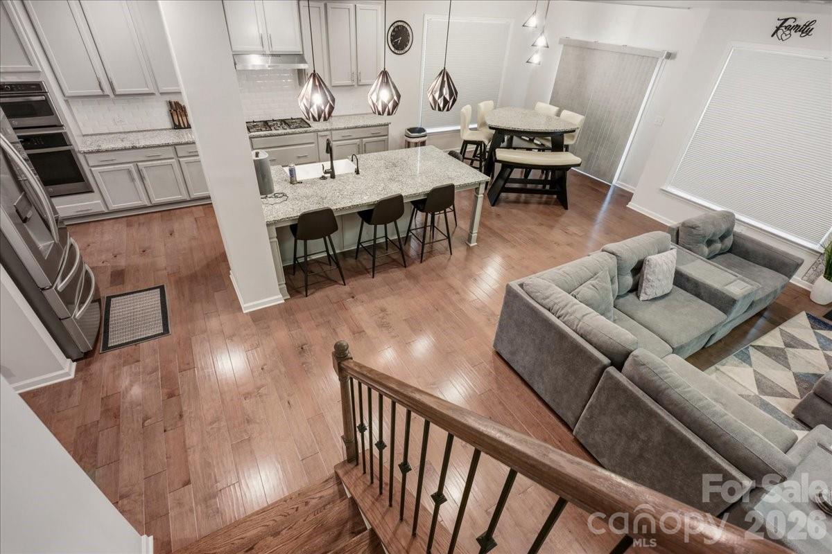 3001 Sterling Drive Waxhaw, NC 28173 - Photo 9 of 38 a living room with furniture and wooden floor