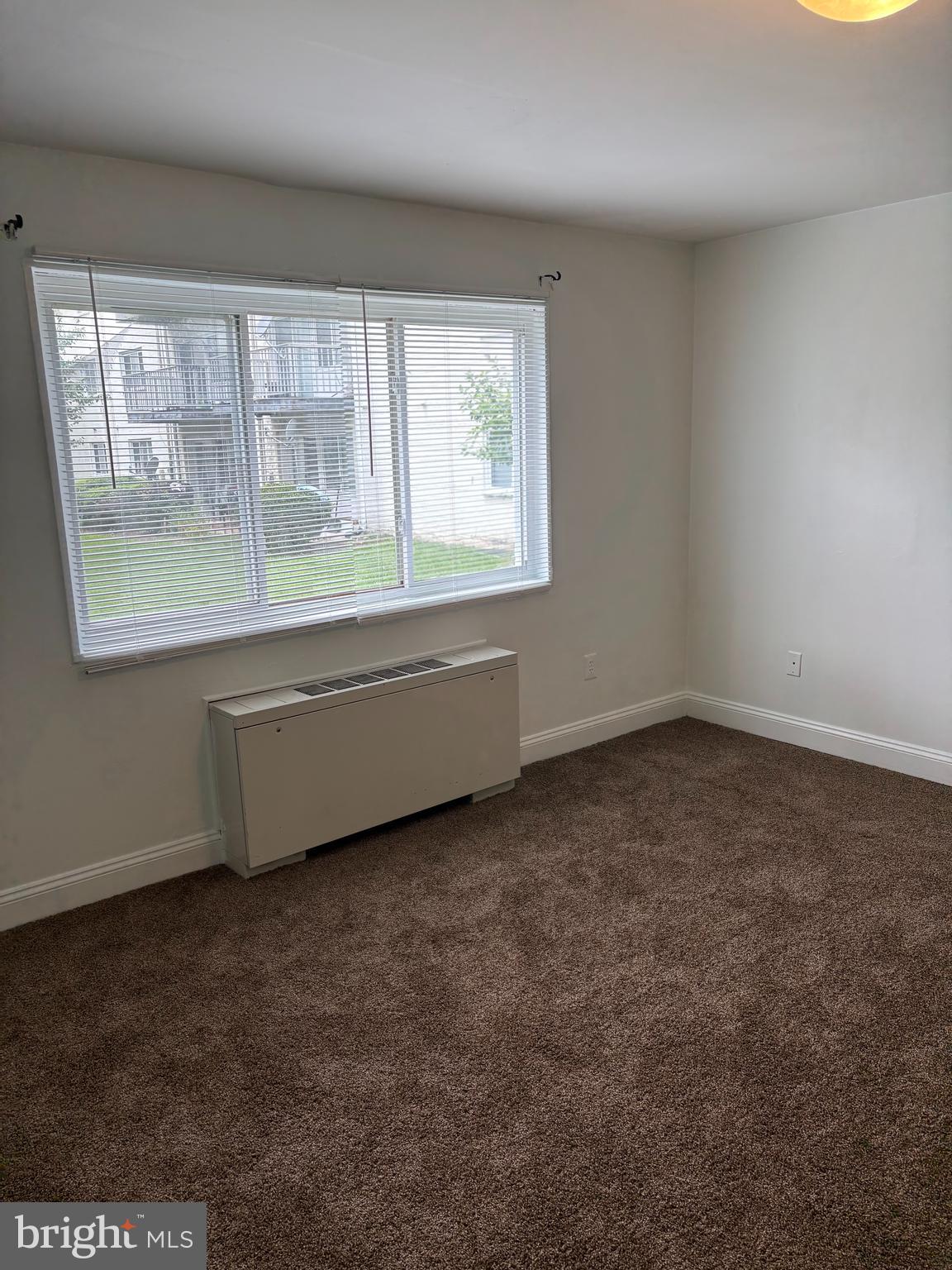 1005 Chillum Road, Unit 212 Hyattsville, MD 20782 - Photo 11 of 13 an empty room with a window