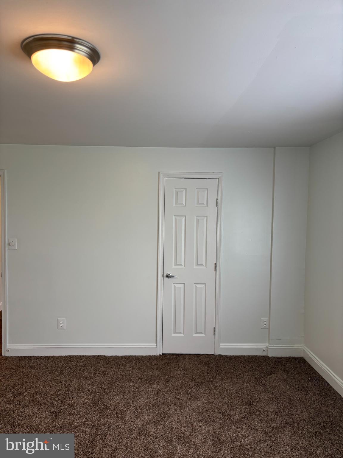 1005 Chillum Road, Unit 212 Hyattsville, MD 20782 - Photo 12 of 13 a view of an empty room with a window