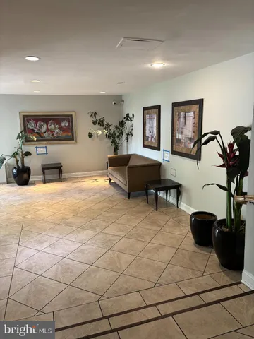 a bedroom with furniture and a bed