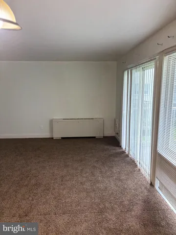 a view of room with hardwood